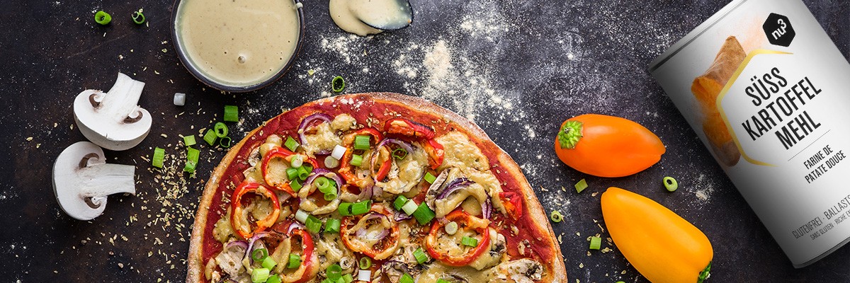 Glutenfreie Pizza mit buntem Gemüse